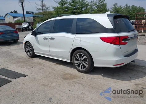 2021 Honda Odyssey Touring z USA, uszkodzony, nr VIN 5FNRL6H80MB010952